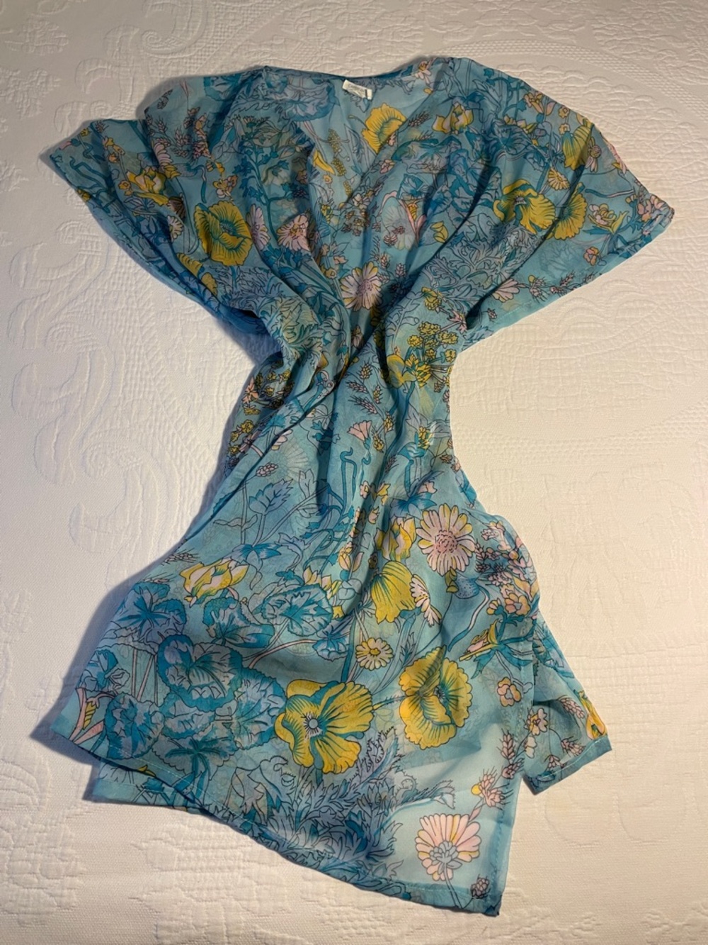 Beach Cover-up. Delicately fabric & flows with lights colors at the beach.